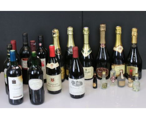 A collection of six bottles of sparkling wine to include Cava, Chardonnay-Pinot Noir...etc.. together with A collection of ni