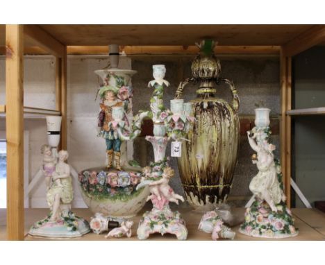 Continental Porcelain Four Sconce Candelabra set with cherubs and floral encrusted 46cm high together with a similar Figural 