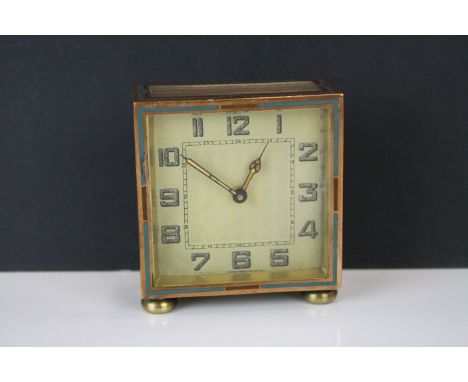 Art Deco Dressing Table 8 day Clock, the silver plated engine turned case with enamel decoration, 7cm high 