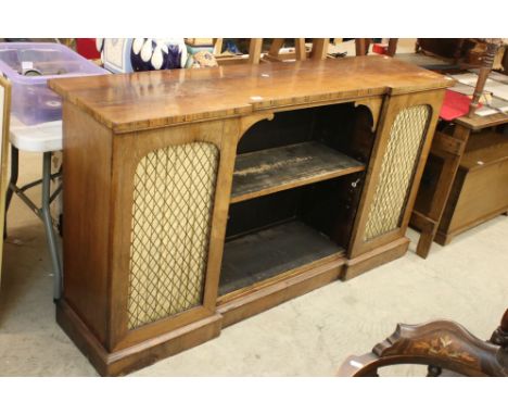 Early Victorian Rosewood Inverted Breakfront Sideboard with central open bookcase flanked by two gilt metal grill and fabric 