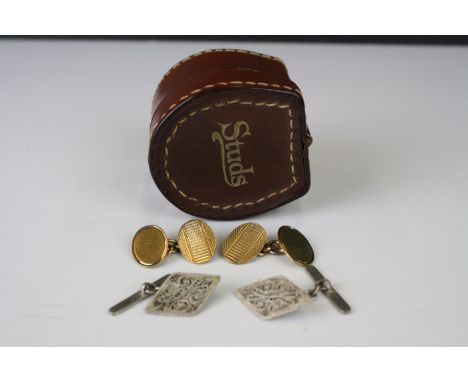 A pair of fully hallmarked 9ct gold gentleman's cufflinks with engine turned decoration together with a white metal pair and 