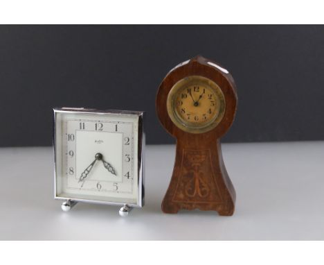 An early 20th century Edwardian mahogany cased clock together with a mid 20th century Bentine clock. 