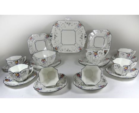 An Art Deco Shelley bone china six setting tea service Decorated with peaches and grapes in the Queen Anne shape, factory mar