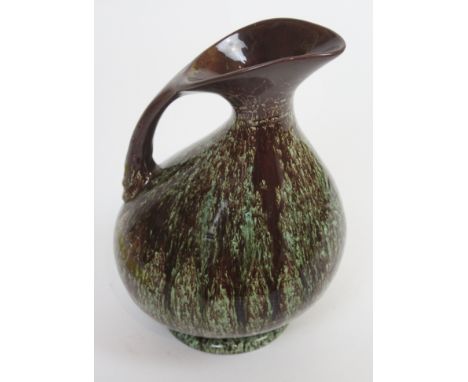 Dr Christopher Dresser for Linthorpe Pottery Aesthetic movement Henry Tooth jug With angular handle and stepped joint, impres