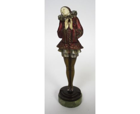 Paul Philippe (1870-1930) Art Deco bronze and ivory ‘Pierrette’ With cast decoration of scrolls with red colour, cast signatu