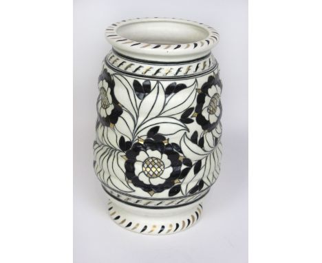 A Charlotte Rhead Crown Ducal vase Of cylindrical form with ribbed body, decorated in the Tudor Rose pattern, printed factory