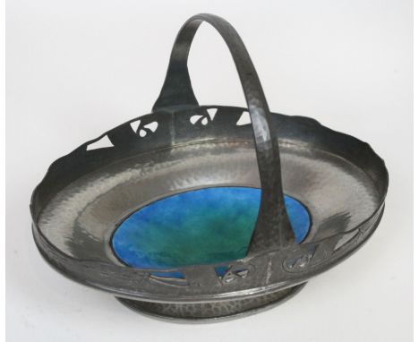 Archibald Knox for Liberty & Co Tudric Pewter basketHaving cast and planished decoration to body, the centre with blue and gr