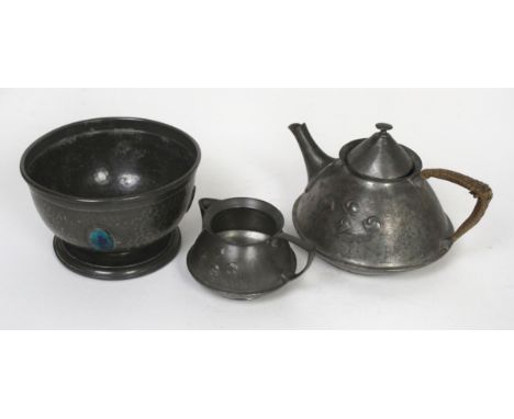 An Arts & Crafts English Pewter two piece tea servicePattern number 0303, together with a similar bowl having planished decor