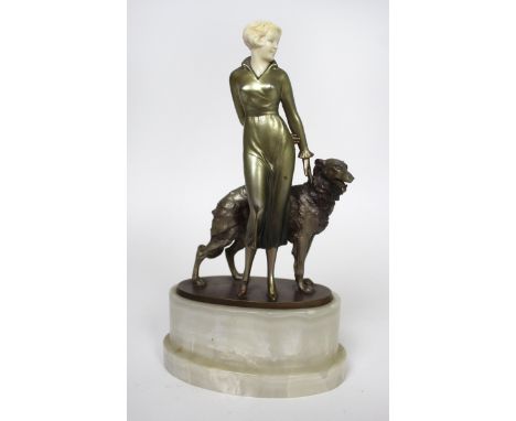 Josef Lorenzl (1892-1950) Art Deco bronze and ivory figure group Modelled as a fashionable lady beside a Borzoi dog, cast sig