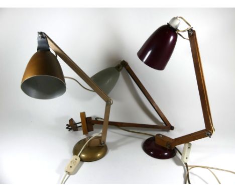 Two Vintage angle poise lamps with wooden framesTogether with a vintage table clamp lamp