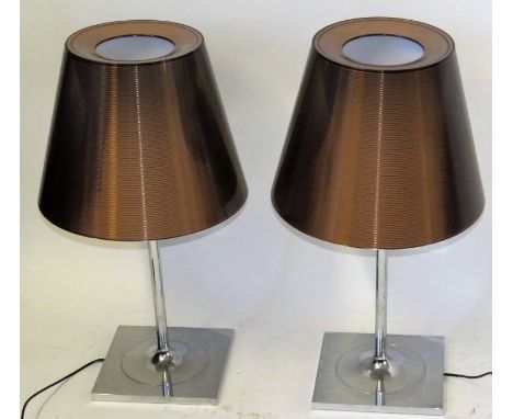 A pair of contemporary Philippe Starck Flos table lamp Each with rippled Perspex shades, raised on chrome column supports, he