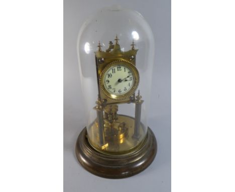 A Brass Pillar Clock Under Glass Dome, Suspension In Need of Re-attachment, 29cm high 