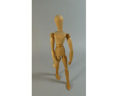 A Wooden Artists Movable Mannequin Figure, 32cm high 