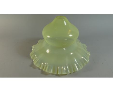 A Victorian Vaseline Glass Lamp Shade with Wavy Rim, Hairline Crack Extending From Rim by 9cm, 32cm Diameter