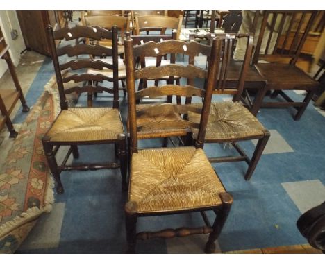 A Collection of Four Various Rush Seated Ladder Back and Side Chairs