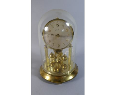A Brass Pillar Clock by Bentima, 17cm High 