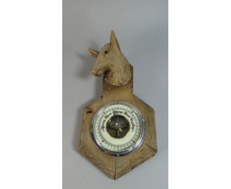 A Continental Carved Wooden Framed Aneroid Barometer with Stags Head, Missing Antlers, 28cm High 