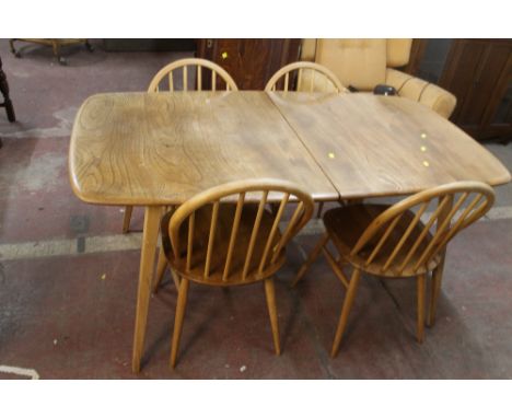 AN ERCOL TABLE AND FOUR CHAIRS