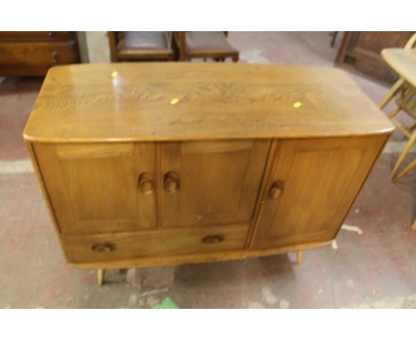 A LIGHT ERCOL SIDEBOARD