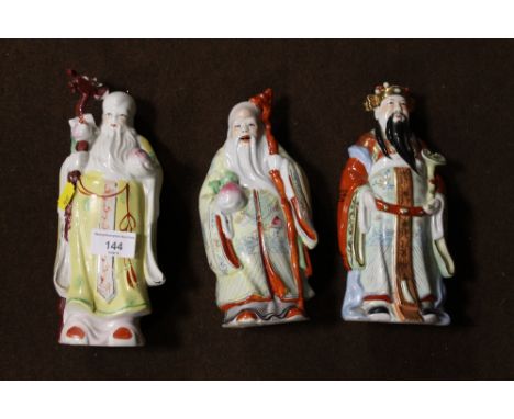A SELECTION OF THREE ORIENTAL STYLE CERAMIC FIGURES