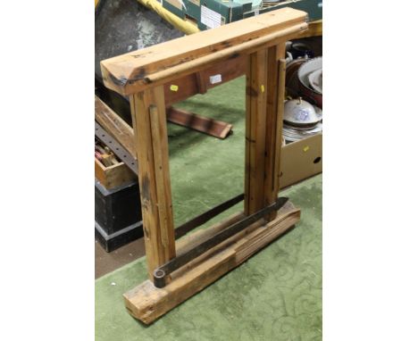 A WOODEN FRAMED MIRROR