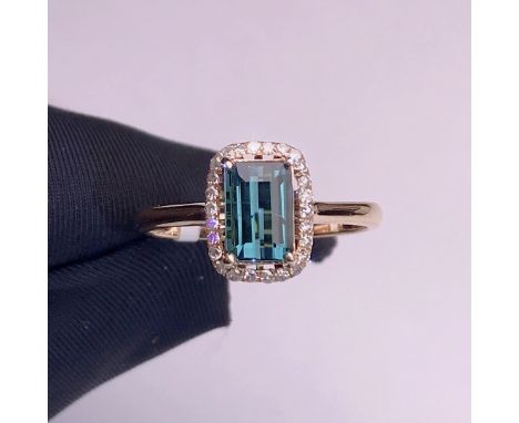 18K gold inlaid natural blue tourmaline ring Total weight: 2.03g Main stone: 1.3ct Diamond: 26PFreight:1.International Freigh