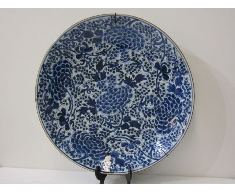 ORIENTAL CERAMICS, quality under glazed blue charger decorated stylised Peony 39cms diameter with Kangxi mark to base Lot 281