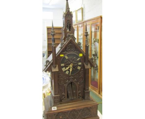 GERMAN ARCHITECTURAL BRACKET CLOCK, large carved steeple form bracket clock in the black forest style, the cuckoo style openi