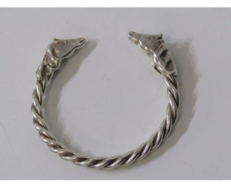 WHITE METAL, TESTS AS SILVER, double horse head torque bangle, approx. 68.5 gramslot 77 - good condition throughout  