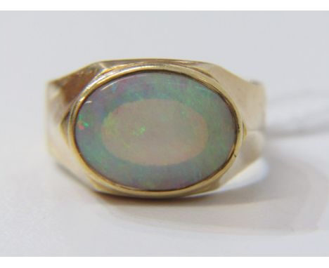 LARGE OPAL RING, 18ct heavy yellow gold ring set with cabochon style opal, ring size Q. 6.2 grams  lot 5 - ring in good order