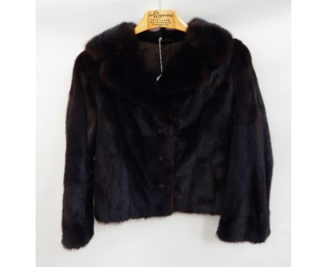 A dark mink coat labelled "Sigurd Heggemsnes Pelsmaker, Oslo"  Live Bidding: If you would like a condition report on this lot