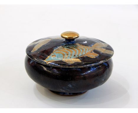Robert Goldsmith earthenware covered trinket bowl decorated with gold and turquoise fish, on mottled brown and blue ground, i