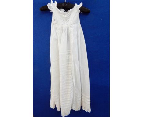 A vintage cotton christening gown with broderie anglaise detail, a white cotton baby gown with broderie anglaise and pin tuck