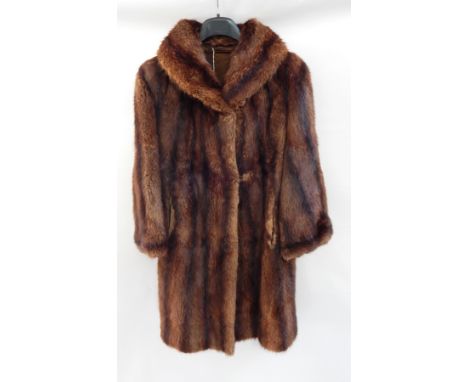 A vintage musquash fur coat (needing some repairs)  Live Bidding: If you would like a condition report on this lot, please co