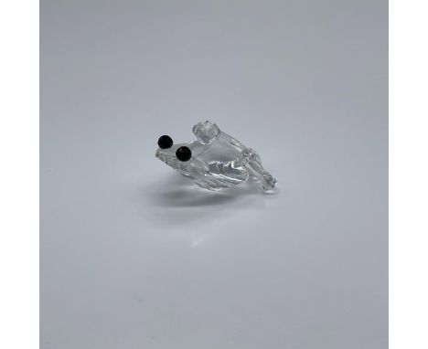 Part of the Beauties of the Lack collection. A tiny clear crystal amphibian wearing a tiny clear crystal crown. Swarovski swa