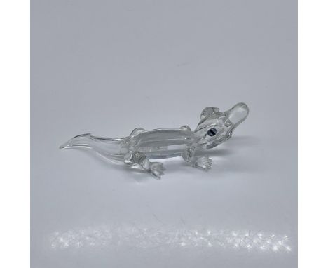 Also called Crocodile. Part of the Endangered Species collection. A tiny gator made from clear faceted and smooth crystal. Bl