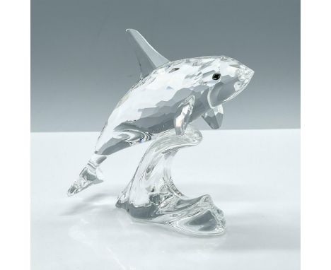 This retired Swarovski Orca was part of the South Sea collection. The piece is made from clear crystal, and is represented as