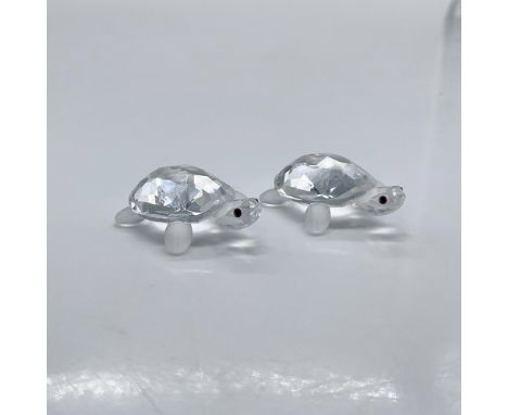 Part of the In The Secret Garden collection. A set of two tiny tortoises. Made from clear and frosted crystals, and black cry