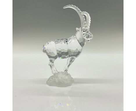 Part of the Endangered Species theme. A clear faceted body with black eyes and frosted horns. Attached to a frosted base. Swa