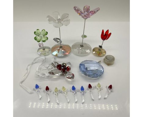 This grouping includes four rocking flowers, two tall and two short, a water window ornament, a flower ornament, and 9 mini t