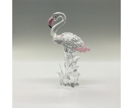 Part of the Feathered Beauties series. Elegant lead crystal flamingo wading in shallow waters with faceted clear crystal body