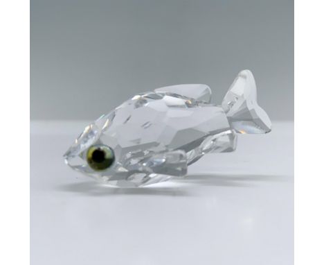A small goldfish in a swimming position, adorned with melon-colored eyes. Swarovski backstamp. This item has its original box
