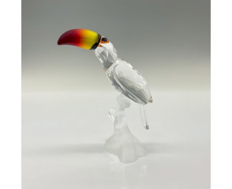 The Toucan is made of clear crystal and sits on a branch of frosted crystal. The beak is of fire opal. Swarovski etched backs