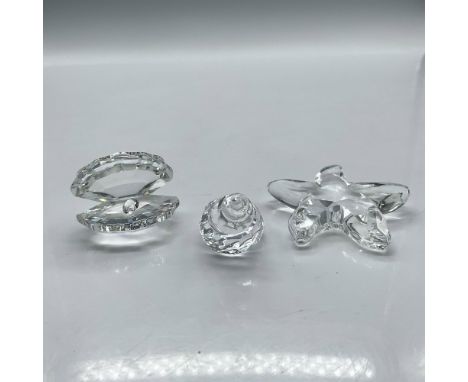 Crystals included in this trio: starfish, conch shell and clam. Swarovski backstamp. 7624 NR 100 000. 191697. This item has i