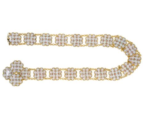 A French giltmetal and enamel waist belt, late 19th c,&nbsp;painted with roses on a white ground, 73cm l  The collection of C