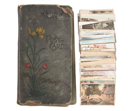 An Edwardian postcard album, the postcards including real photographic, interior of a bicycle factory and shop front of Willi
