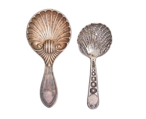 A George V silver caddy spoon,&nbsp; with fluted shell bowl and pointed handle, by Henry Williamson Ltd, Sheffield 1911 and a