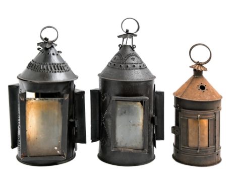 Three English tinplate horn lanterns, 19th c, two of three aspect, one stamped with hearts, 24-30cm h  The collection of C. W