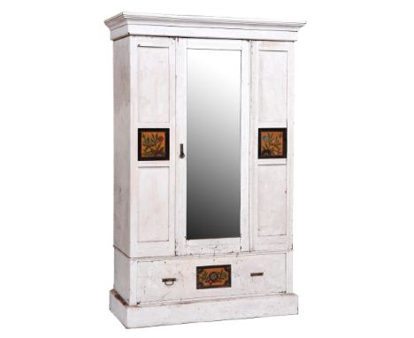 A Victorian Aesthetic painted wardrobe, the panelled doors flanking the mirror with central panel of gilt ground flowers, dra
