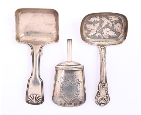 Three silver caddy spoons, comprising a shovel engraved with shield cartouche, lacks handle, 58mm l, by Cocks &amp; Bettridge